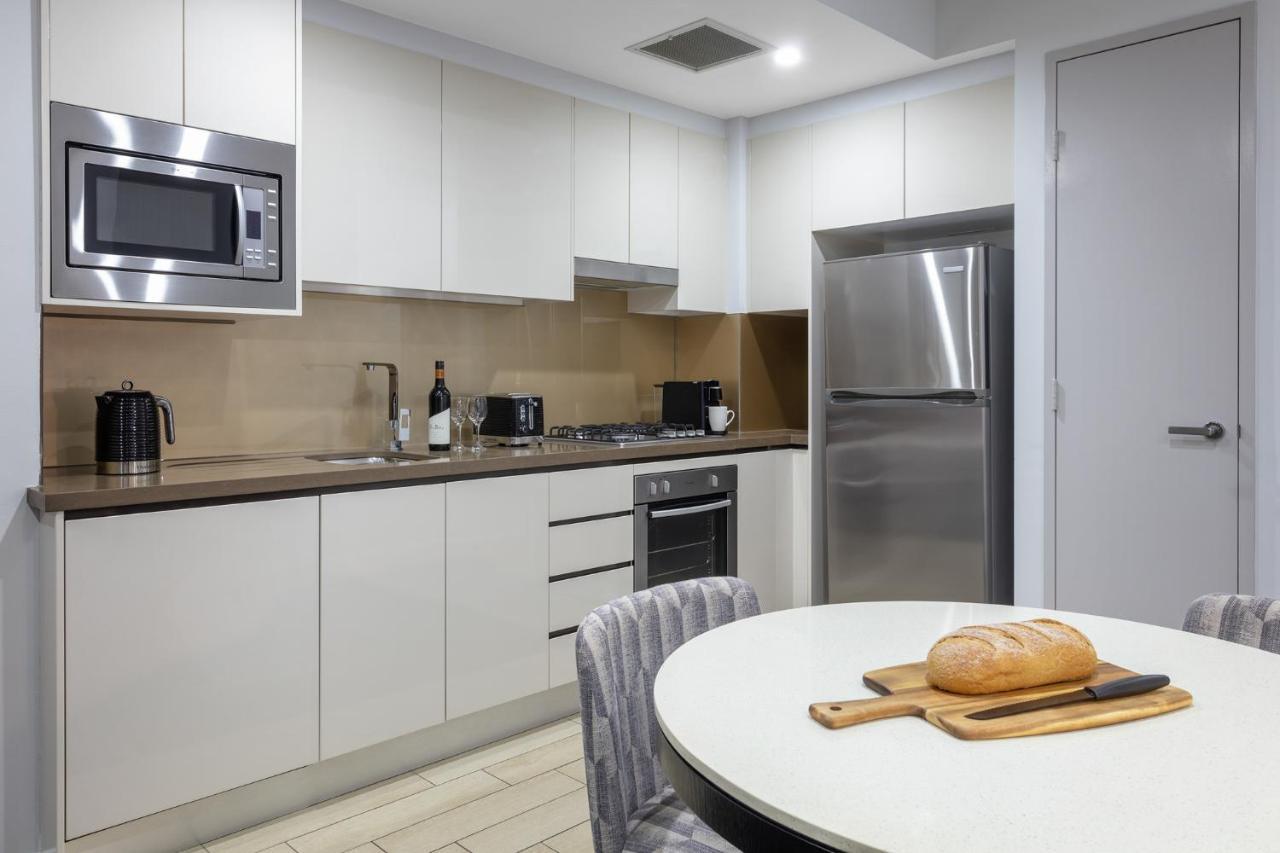 Meriton Suites North Ryde Sydney Exteriör bild A typical kitchen in a residential apartment