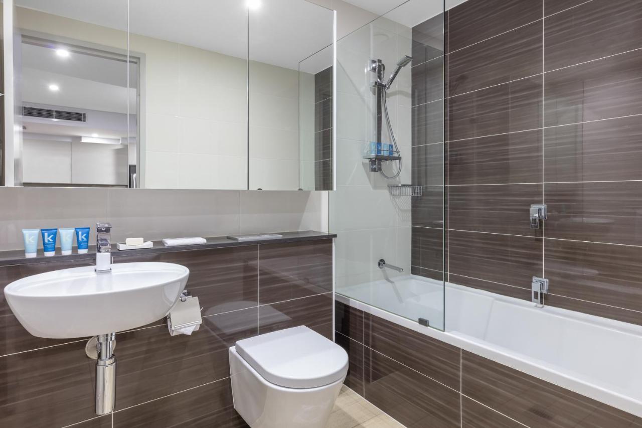 Meriton Suites North Ryde Sydney Exteriör bild A typical bathroom in a Premier Inn