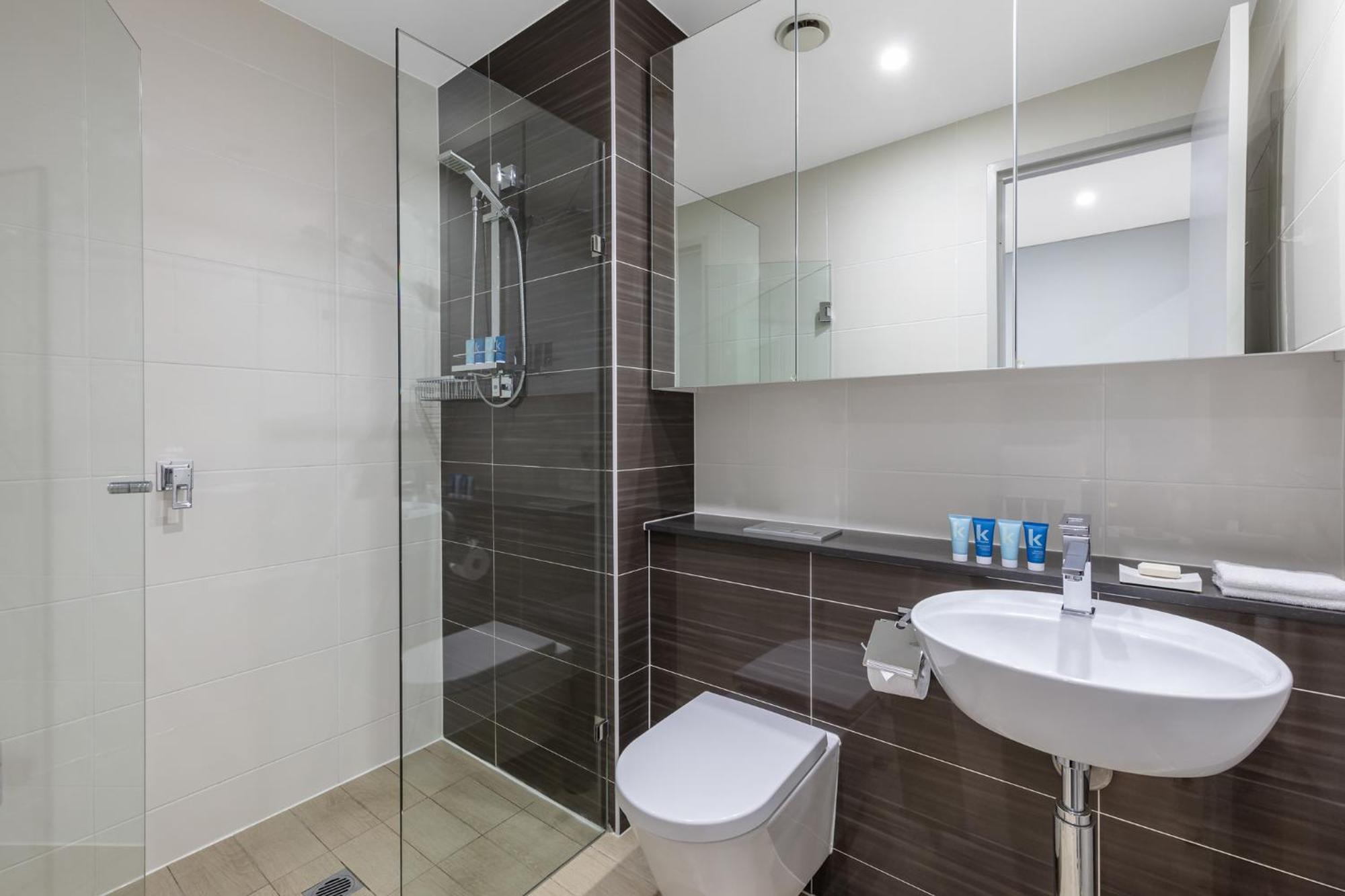 Meriton Suites North Ryde Sydney Exteriör bild A modern bathroom